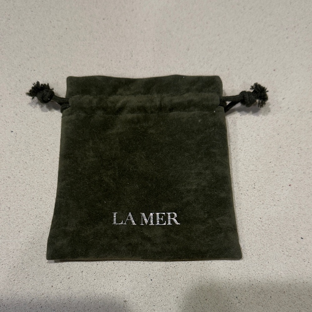 La Mer green crushed velvet small drawstring pouch
